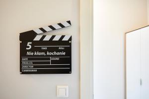 Certyfikat, podpis lub inny dokument wystawiony w obiekcie FLORIANSKA 32 by PI Apartments