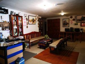 The lobby or reception area at Hostal Chimenea