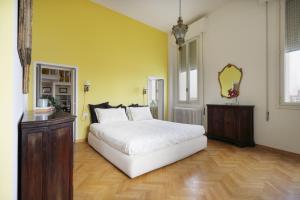 เตียงในห้องที่ CA SAN BIAGIO