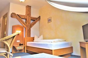 Postel nebo postele na pokoji v ubytování Hotel zum Bräu