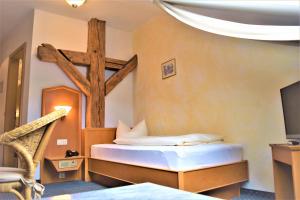 Postel nebo postele na pokoji v ubytování Hotel zum Bräu