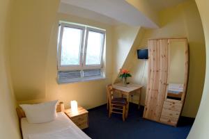 Postel nebo postele na pokoji v ubytování Hotel Atlantic