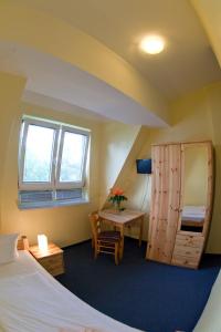 Postel nebo postele na pokoji v ubytování Hotel Atlantic