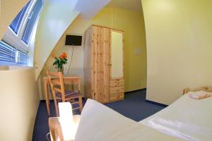 Postel nebo postele na pokoji v ubytování Hotel Atlantic
