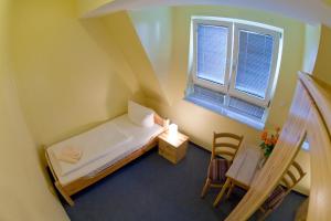 Postel nebo postele na pokoji v ubytování Hotel Atlantic