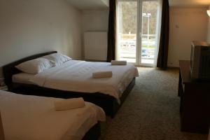 Katil atau katil-katil dalam bilik di Motel Maksumić