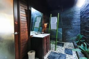 Koupelna v ubytování Coconut Boutique Resort
