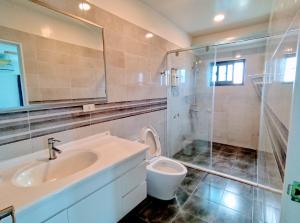 Koupelna v ubytování Shell Sand Homestay + 37 fotografií
