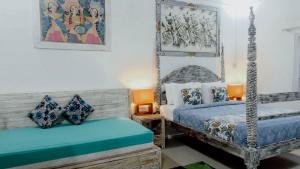 Ein Bett oder Betten in einem Zimmer der Unterkunft Villa Alam Biru Gardenia