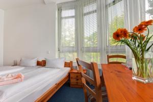 Postel nebo postele na pokoji v ubytování Hotel Atlantic