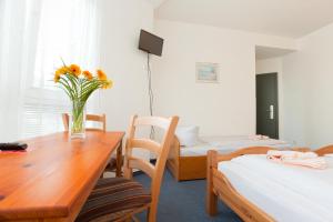 Postel nebo postele na pokoji v ubytování Hotel Atlantic