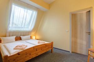 Postel nebo postele na pokoji v ubytování Hotel Atlantic