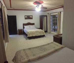 Ένα ή περισσότερα κρεβάτια σε δωμάτιο στο Hotel Tuul