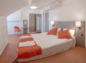 Voodi või voodid majutusasutuse Hamnhotellet toas