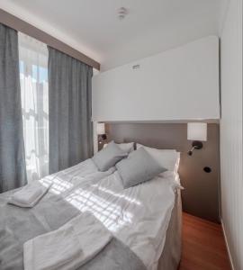 Voodi või voodid majutusasutuse Hamnhotellet toas