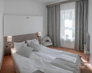 Voodi või voodid majutusasutuse Hamnhotellet toas