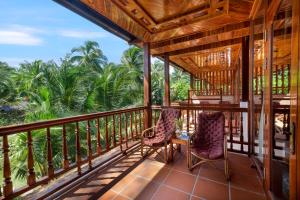 Balkón nebo terasa v ubytování Coco Palm Beach Resort
