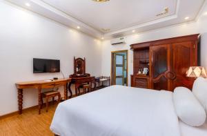 TV a/nebo společenská místnost v ubytování Coco Palm Beach Resort