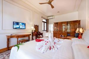 TV a/nebo společenská místnost v ubytování Coco Palm Beach Resort
