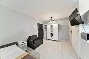 Kuchyň nebo kuchyňský kout v ubytování Apartament Szarotka - Apartamentuj