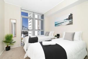 Amazing River View - 3 Bedroom Apartment - Brisbane CBD - Netflix - Fast Wifi - Carpark客房内的一张或多张床位