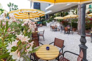 A patio or other outdoor area at Hotel Astoria