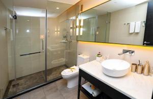 Vannas istaba naktsmītnē Citadines Gaoke Liangjiang Chongqing