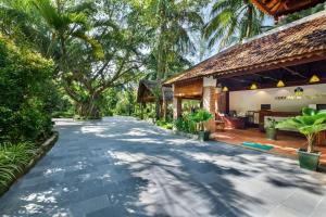 Zahrada ubytování Coco Palm Beach Resort