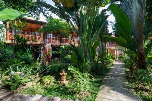 Zahrada ubytování Coco Palm Beach Resort