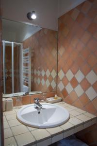 Un baño de Chambres d'hôtes Les Pratges