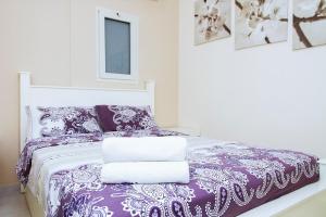 Postel nebo postele na pokoji v ubytování Apartments4you Bally