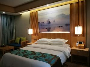 昆明云闲居茶文化主题酒店客房内的一张或多张床位