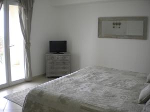 Кровать или кровати в номере Domaine de Campras B&B