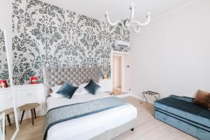 Letto o letti in una camera di Rhea Silvia Luxury Navona