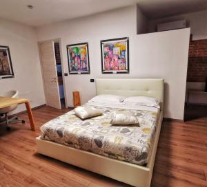 Postel nebo postele na pokoji v ubytování Regis B&B Camere centro storico