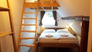 Postel nebo postele na pokoji v ubytování Wellness chata - Krkonoše + 37 fotografií