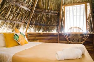 Llit o llits en una habitació de Selina Puerto Viejo