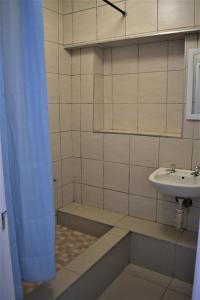 Kúpeľňa v ubytovaní Emakhosini Self-Catering Apartments