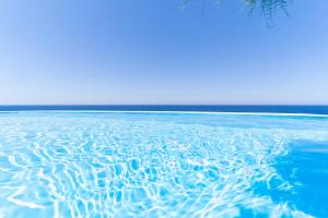 The swimming pool at or close to Ikarian Endless Blue