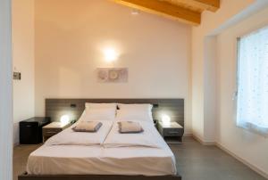 Ένα ή περισσότερα κρεβάτια σε δωμάτιο στο B&B Terrebianche
