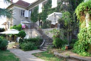 Vonkajšia záhrada v ubytovaní Chambres d'hôtes Les Pratges