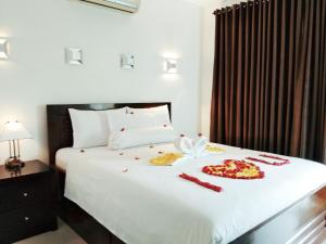Voodi või voodid majutusasutuse Jos & Hanny Homestay toas