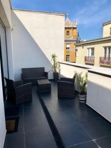 Balkón nebo terasa v ubytování City Center Penthouse