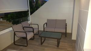 A seating area at Migyana Horadada