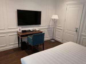 TV a/nebo společenská místnost v ubytování Casa tua Spa Resort