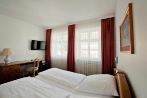 Voodi või voodid majutusasutuse Hotel Alt-Ringlein toas
