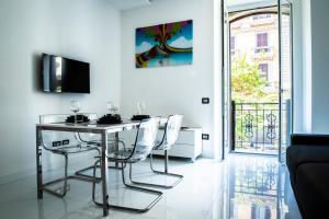 A television and/or entertainment centre at Rettifilo 201 Exclusive Rooms