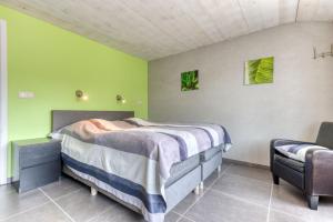 Voodi või voodid majutusasutuse Château Ferme de Laval toas