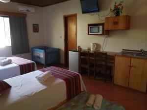 Lova arba lovos apgyvendinimo įstaigoje Las Orquideas Parque Hotel