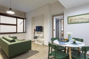 A television and/or entertainment centre at Genova XXV Aprile by Wonderful Italy